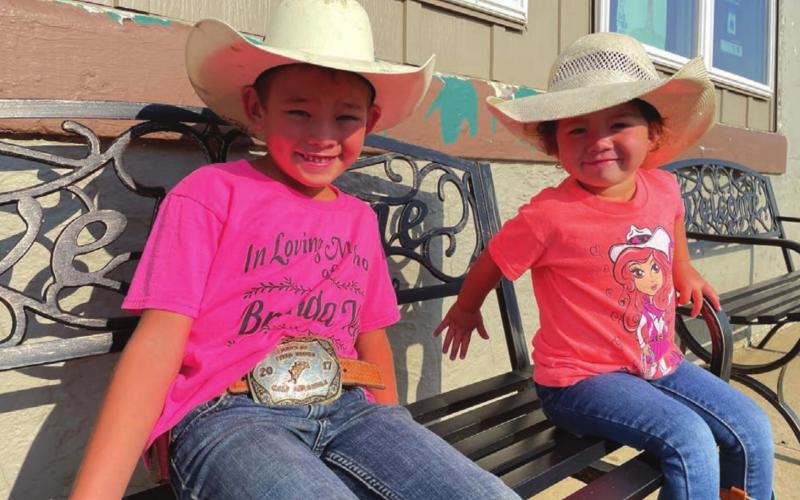 Ryder Veit, 7, and his little sister Ramzi, are ready for the Days of 1910. Ryder, one of the celebration’s youngest volunteers, will be working as an arena cleaner (for the first time) with Ridge Takes The Knife, 6, at the Saturday and Sunday evening performances. He’ll be riding one of his two favorite horses, River or 30 Days, to move calves and steers back into their pens after events. Ryder and Ramzi are the children of Roy and Mikki Veit of Timber Lake.
