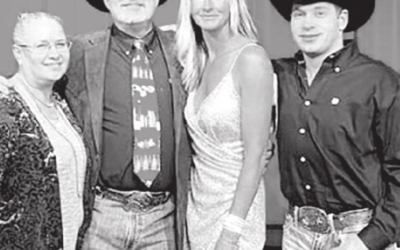 Michelle Alley and her brother, J.J. Alley (RIGHT) with Paul and Traci Brown (AT LEFT) when Michelle was inducted into the Hill College Athletic Hall of Fame. Michelle and J.J, are children of Robert Alley of Isabel. Paul Brown was her rodeo coach at Hill College.