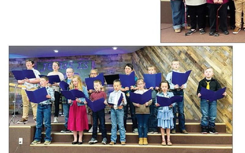 The K4J singers from Holy Cross Church performed at the Spring Sing for the first time. They were led by Cheryl Lawrence and Sarah Schweitzer. Some of the students also sang with the Holy Cross Choir. FRONT (L-R): Brody Kraft, Elyse Parker, Stetson Schweitzer, Gunner Wright, Stella Nilson, Kiernan Biegler; BACK: Baylor Bickel, Maya Biegler, Garrett Nilson, Sophia Gross, Luke Biegler, Mason Hollenbeck, Gracen Gill, Isaac Schweitzer.