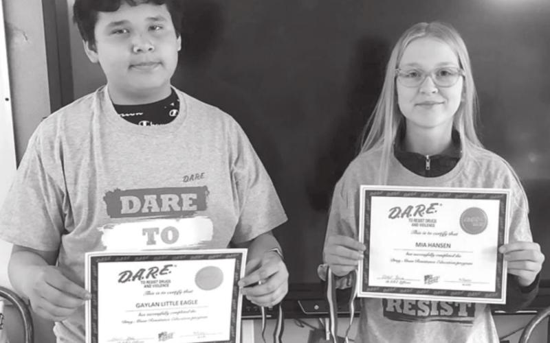 Carmelo Little Eagle and Mia Hansen wrote the best essays at the end of the 10-week DARE class at McIntosh School.