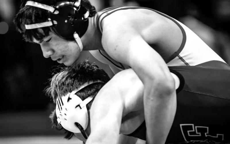 Cheyenne-Eagle Butte/Dupree 138 pounder Tripp Schrempp in action during the State Class A Wrestling Tournament in Pierre last week. Schrempp finished the season with a 17-21 overall mark. Photo by Robert Slocum