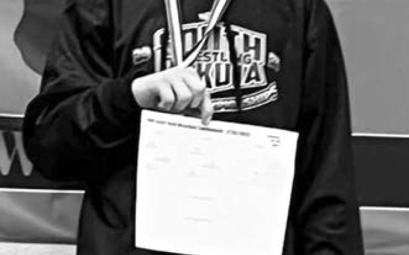 Levi Berndt, left, of Isabel won the championship in the Schoolboy 138-140 division at the Faith Youth Wrestling Invitational Tournament on Sunday, Feb. 27. He was one of seven Dupree Youth Wrestling Team members to win a title in the event.