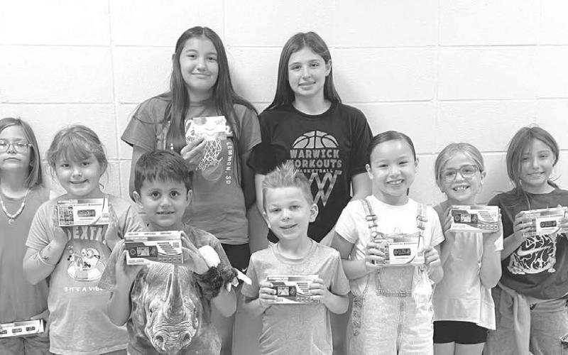 Big prize drawing winners who met their Accelerated Reading goals are: Front (l-r): Azalea Grage, Wren Jones, Pieter Scholtz, Laysen Gimbel, Marie Bad Warrior, Elsie Maher, Cora Wiedmer; Back: Ava Grant, Finley Boldt. Not pictured: Kinzlee Martin.