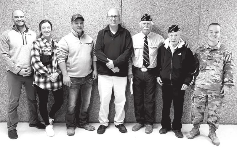 Veterans and active military personnel recognized at the Timber Lake Middle/High School Veterans Day program on November 10 were (L-R): Major Jason Booth (active US Air Force); Kay Booth (active US Air Force); Adrian Winterberg (US Army); Dan Martin (Army National Guard); Jack Bickel (US Army); Andy Aberle (US Army); and Jesse Winterberg (active SD National Guard).