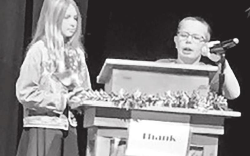 Fourth graders Josie Boldt (LEFT) and Garrett Nilson announced all veterans in attendance and the names of friends/family members who served in the military that were submitted by students.