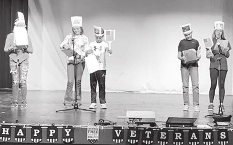 Fifth grade readers theater L-R: Sequoia Taken Alive, Katie Martin, Camden Ley, Owen Schweitzer, and Addison Lindskov