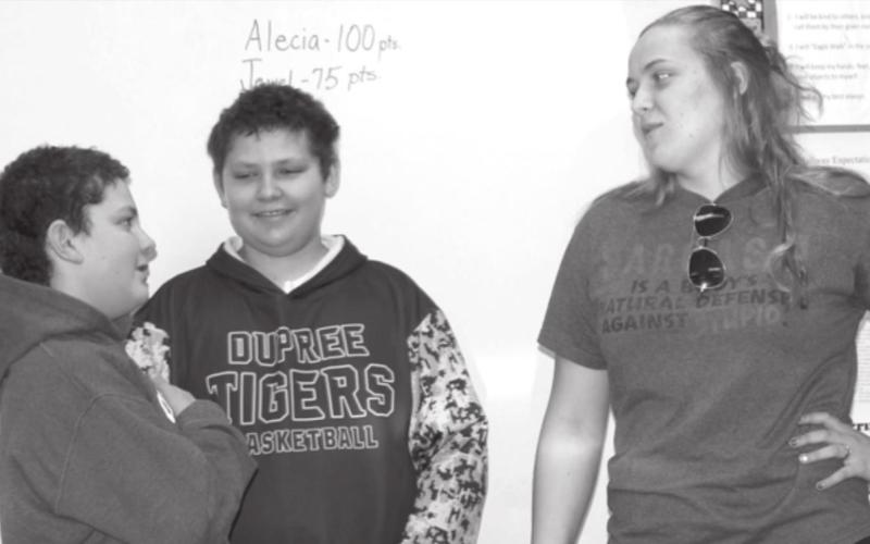 Maverick and Wyatt Lemke role playing on how to say no to vapes being offered to them by an older student, played by their sister Erin Lemke, for the second grade students. Photo by Patty Peacock