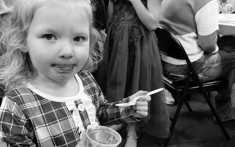 Jessa Aberle enjoys a snack after the program.