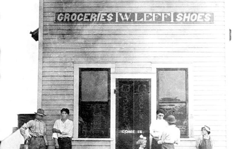 Wenzel Leff’s store, which he started in 1910, was located on “upper Broadway.” He is the dark haired man second from the left.