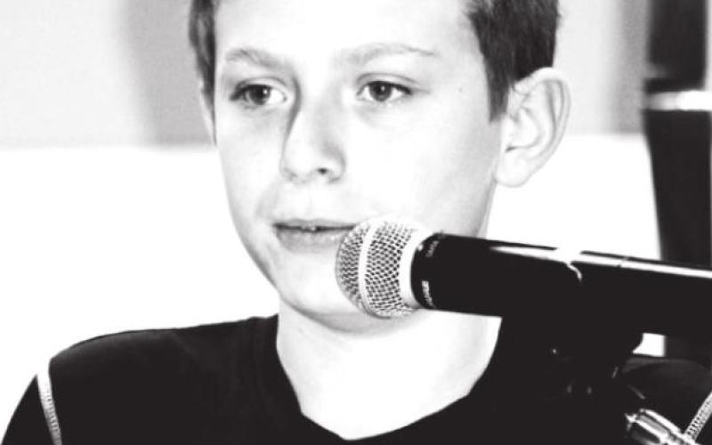 Leo Bakeberg IV reading his winning Veteran's Day poem.