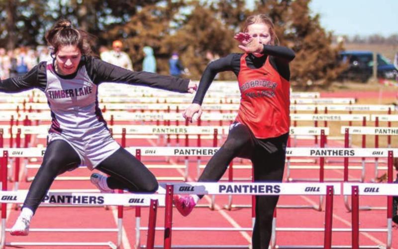 Timber Lake senior Abby Linderman leads her heat in the hurdles at the Timber Lake tune-up meet last week. Photos by Jon Flatland