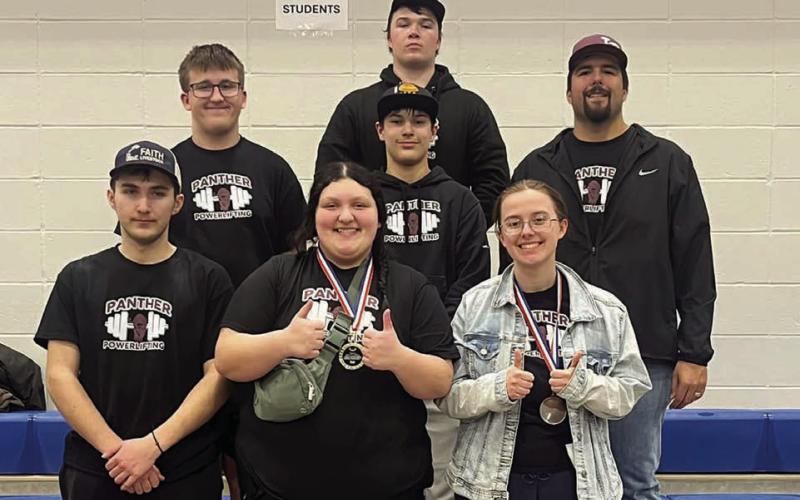 The Timber Lake High School powerlifting team includes (front, l-r): Jack Hornick, Anna Kraft, and Maria Scherer; (middle) Evan Schweitzer, Blaise Lei, and Coach Jakways Mendoza; (back) Brady Maher. Not pictured is Cooper Goldade. Submitted photo