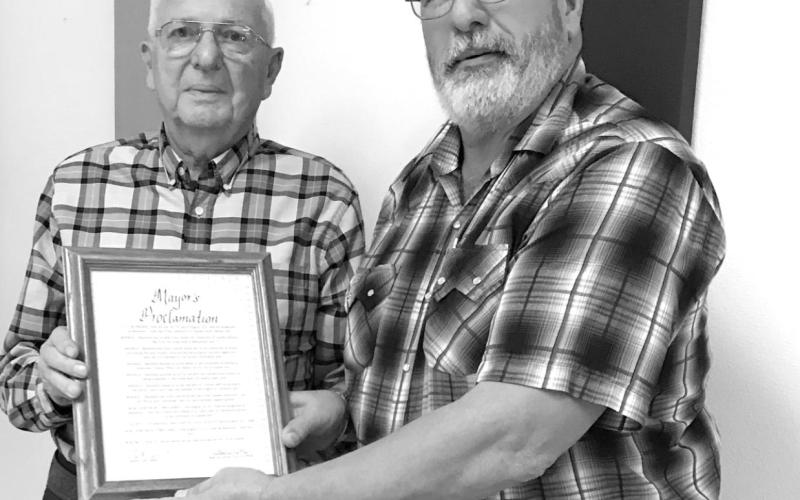 Sam Owen, Mayor of Dupree (RIGHT), presented Ray Lenk with a proclamation from the city council declaring August 14, 2021 as Ray Lenk Day in Dupree. Photo by Vicki Schilling