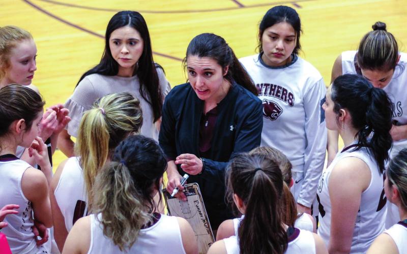 LEFT: Timber Lake girls basketball Head Coach Erin Gimbel (CENTER) and the Panther girls advanced to the SoDak 16 round, where they lost to Corsica-Stickney 48-33 at Huron Arena. Photo by Jon Flatland