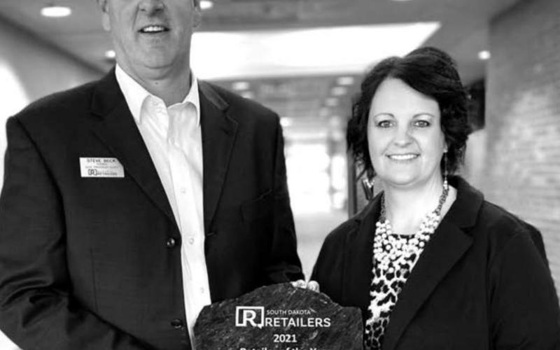 Dana Keffeler (RIGHT), owner of Keffeler Kreations in Faith, received the Retailer of the Year award at the SDRA annual banquet in Pierre.