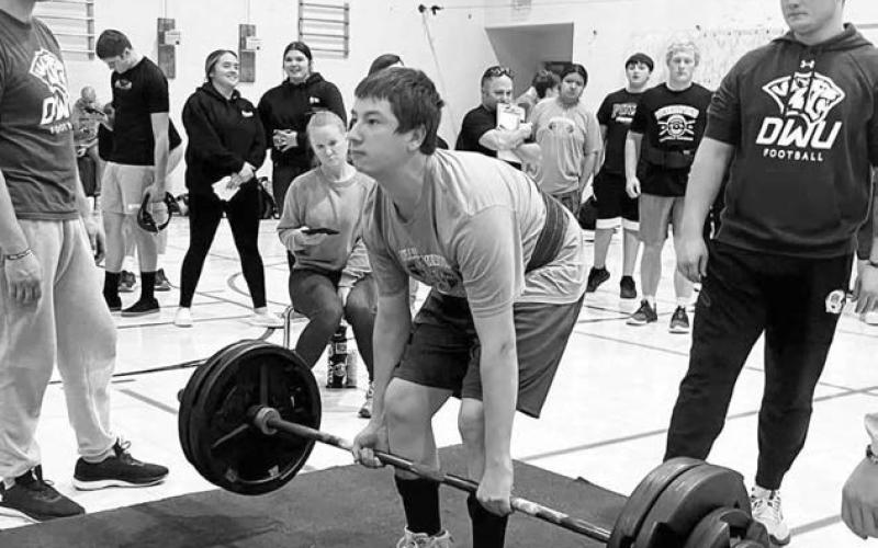 Rio De La Rosa, a junior at Dupree High School, holds a fourth place lift in the 181.75 pound division at the Mitchell Powerlifting Meet on Saturday, Dec. 7.