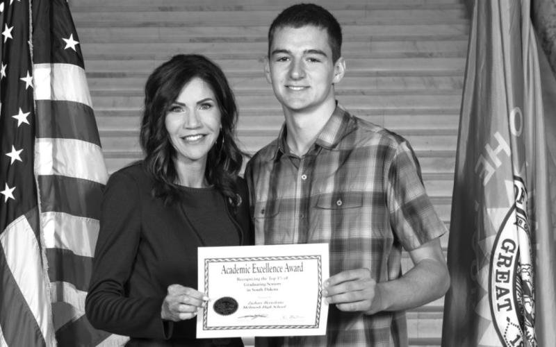 Josh Bertolotto, McIntosh High School top senior, with Gov Noem