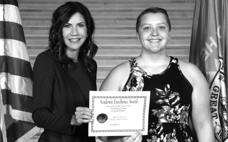 Malory Peacock, Dupree High School top senior, with Gov. Noem