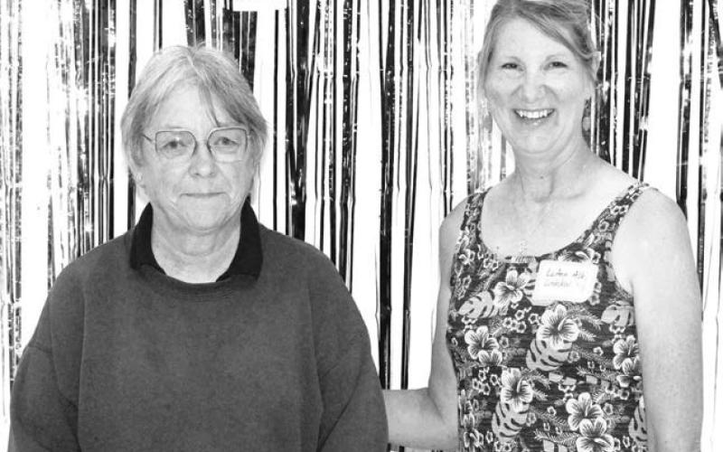 Smiling for the Class of 1981 as they recognized their 45th class reunion were (L-R) Sheila (Fleming) Cook and LuAnn (Alley) Lindskov. Photo by Patty Peacock