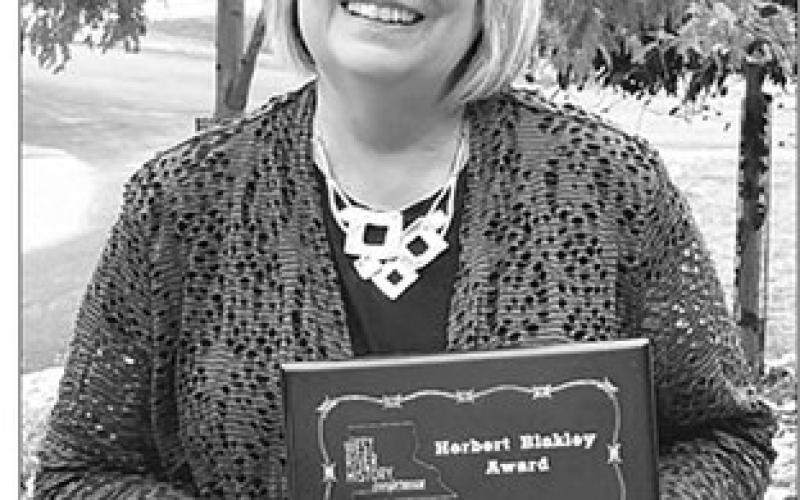 The West River History Conference honored Karen Dahlgren Holzer, formerly of Timber Lake, with the Herb Blakely Award in recognition of her work in local and regional history.