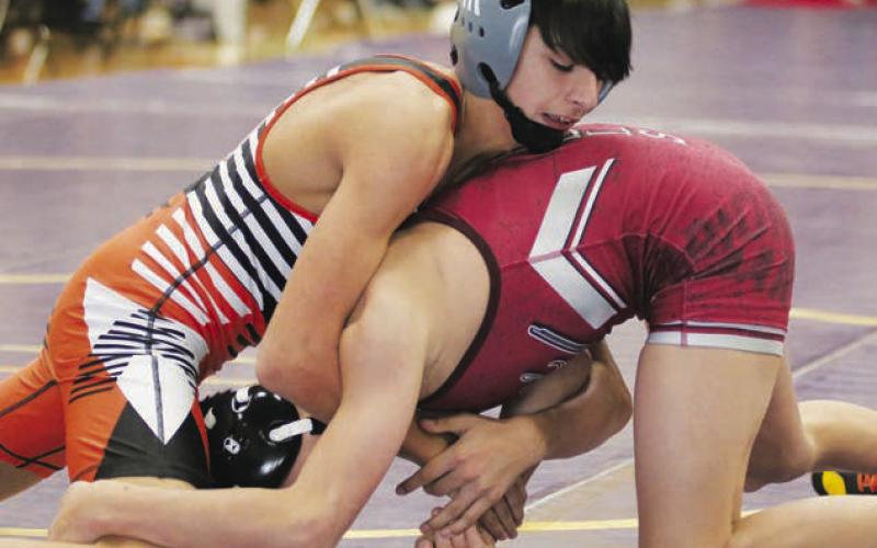 McLaughlin-Timber Lake wrestler Ethan Ward works on an opponent during a match earlier this season. Ward finished sixth place in the 106 pound division at the Region 4B Wrestling Tournament in Lead on Saturday, Feb. 18. Photo by Jon Flatland