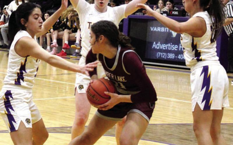 Timber Lake’s Jasmine Nash found herself surrounded by Dupree Tiger defenders after pulling down a rebound during action last Tuesday in Dupree. Nash notched a double-double with 14 points and 10 rebounds but Dupree collected a 56-52 win. Photo by Patty Peacock