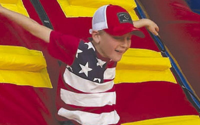 Andrew Zeug enjoys the inflatables at Isabel.
