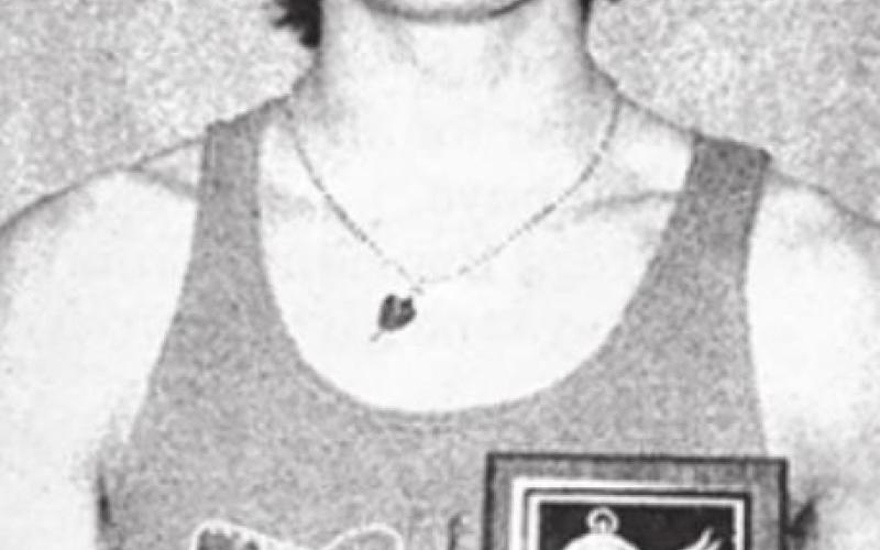 Doug Kraft with the plaque he was awarded when he was named the MVP of the Hoven Legion Relays track meet on April 14.