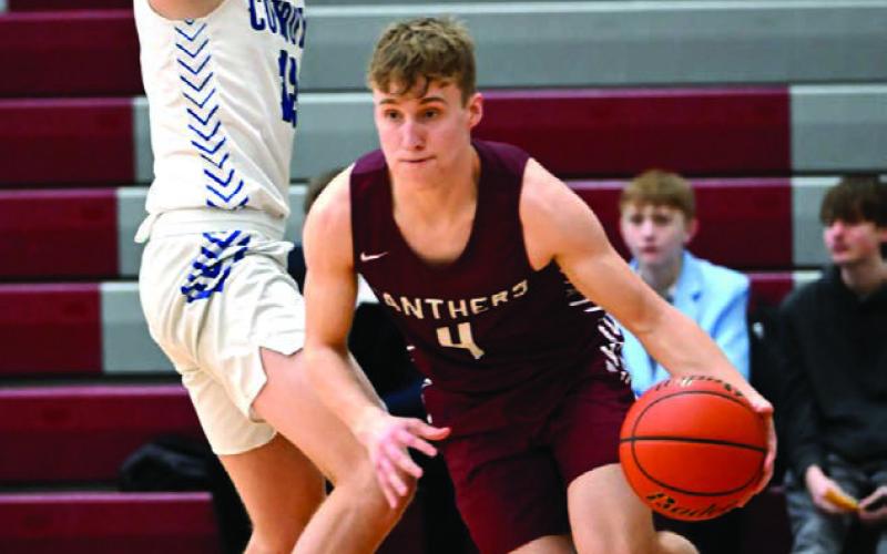 The Timber Lake Panthers captured third place in the 2024 Little Moreau Conference boys basketball tournament last weekend. Above left, Kanton Hunt (left) and Treyton DuPreez go after a loose ball. Left, Kanton Hunt looks for an open teammate in the lane. Above, Gracen Hansen drives the baseline past a Lemmon defender. More sports and photos on Pages 7-10 Photos by Marie Du Preez