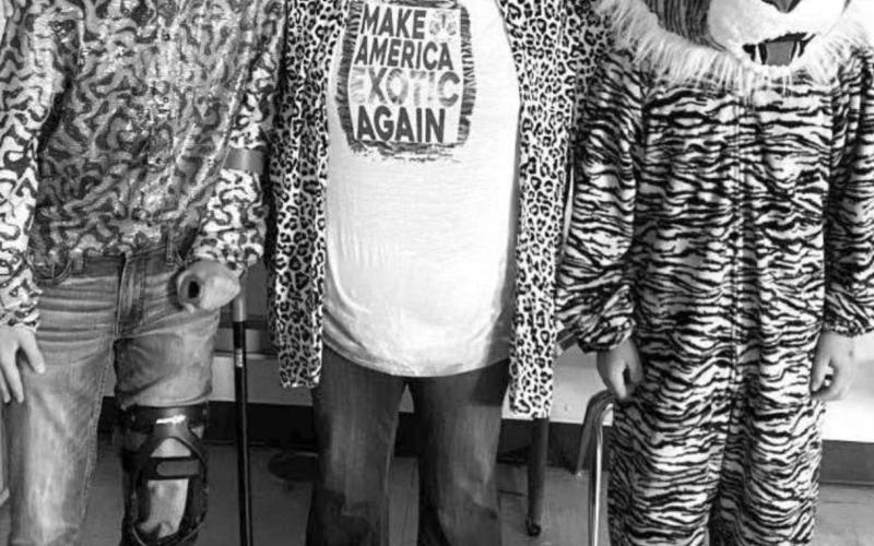 AT RIGHT: The Tiger King (Case DePoy), Carol Baskin (Mrs. Tiffany Pesicka) and their tiger (Alan Lemke).