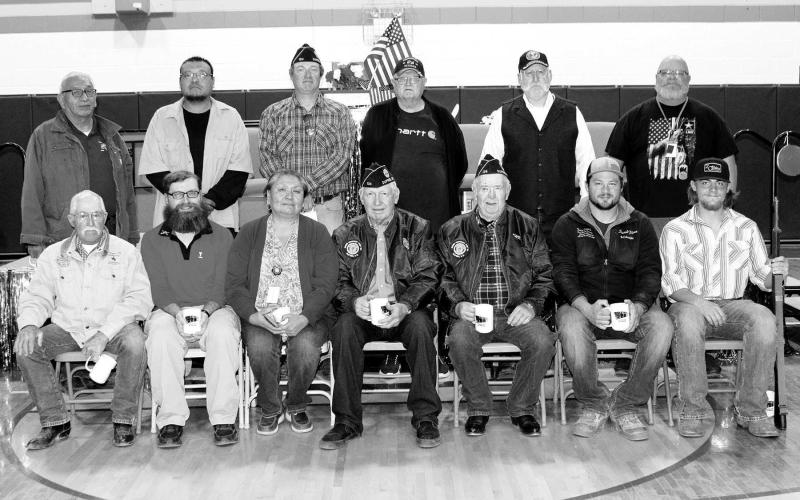 Veterans at the Dupree Veterans Day program included Front (LR): Jim Schmidt, Peter Stahlbrand, Lynnea Swan, John D. Lemke, Clint Farlee, Tate Fischer, Garrett Fischer; Back (L-R): Mike Shaving, Conan Morrison, Leo Bakeberg, Craig Ness, Shannon Hinrichs, and Mark Peacock.
