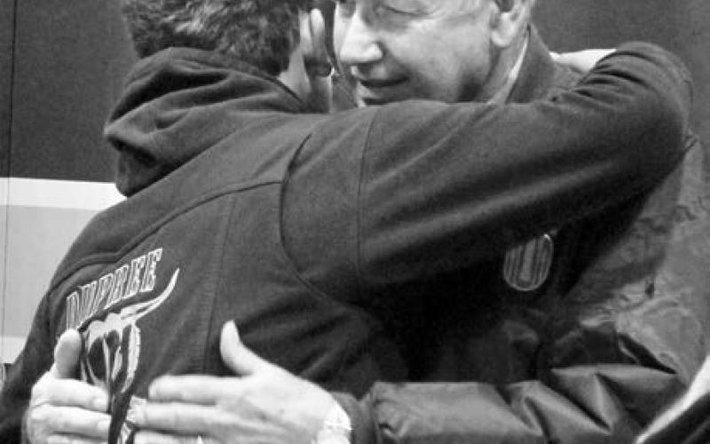 Maverick Lemke gives his grandpa, veteran John D. Lemke, a special hug after the Veteran’s Day Program.