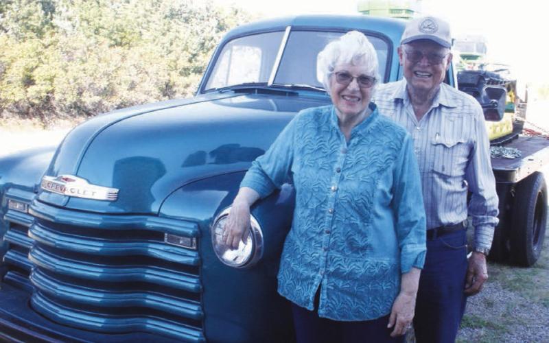Harold and Lois Arnold of rural McIntosh will sell their collection of vintage vehicles on Saturday and don’t plan to keep even one “favorite.” Photo by Jon Flatland