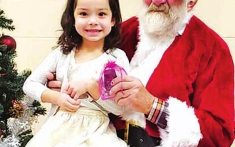 Santa Claus hears wish lists