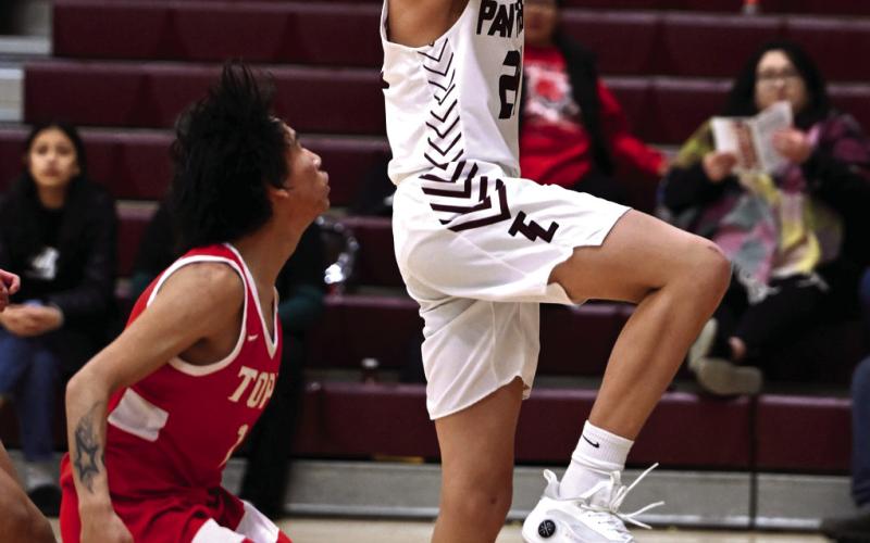 Freshman Kanton Hunt drives past a Tiospaye Topa defender for a layup during Timber Lake’s blowout win over the Thunderhawks last Thursday, Jan. 11. Hunt and teammate Tristan Dupris dropped a team-high 15 points each in the Panthers’ 83-26 victory. Timber Lake was scheduled to play in the Pheasant Shootout in Redfield on Jan. 13 but cancelled its appearance due to extreme cold. Photo by Marie DuPreez