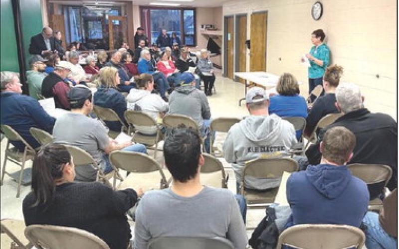 Timber Lake Ambulance Service Director Chris Hermes discusses some of requirements rural ambulance services must adhere to to maintain their license during a public meeting about the future of the service last Thursday, April 4. Nearly 50 people turned out to express their concern over the possibility the service may be discontinued due to staff shortages. The meeting was sponsored by the Timber Lake Topic.