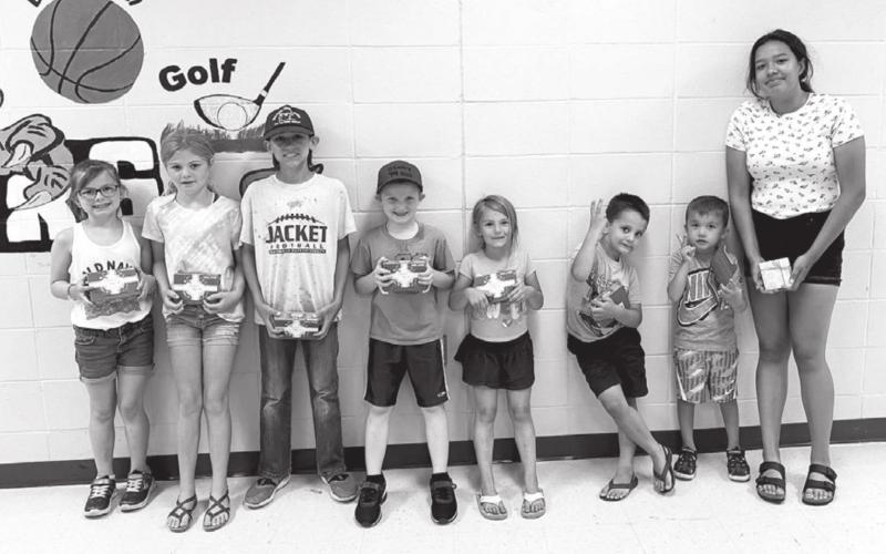 Prize drawing winners who met their AR goal: (L-R) Stella Nilson, Alexa Roggow, Emmett O’Leary, Liam Handeland, Joslyn Goldade, DW Scholtz, Bryson Long, and Kessa Bigger. NOT PICTURED: Barrett Maciejewski and Kamee Mareska