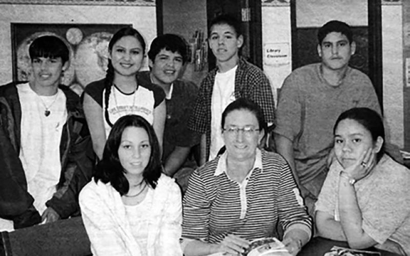 Joan Upell with some of the Tiospaye Topa Media Club students. FRONT: Rosemary Marshall, Joan, Marie Yellow Fox; BACK: Tonweya Ducheneaux, Alana Black Bird, Brad Keckler, John Ducheneaux, and Richard (Bubba) Smith. Timber Lake Topic June 12, 2003