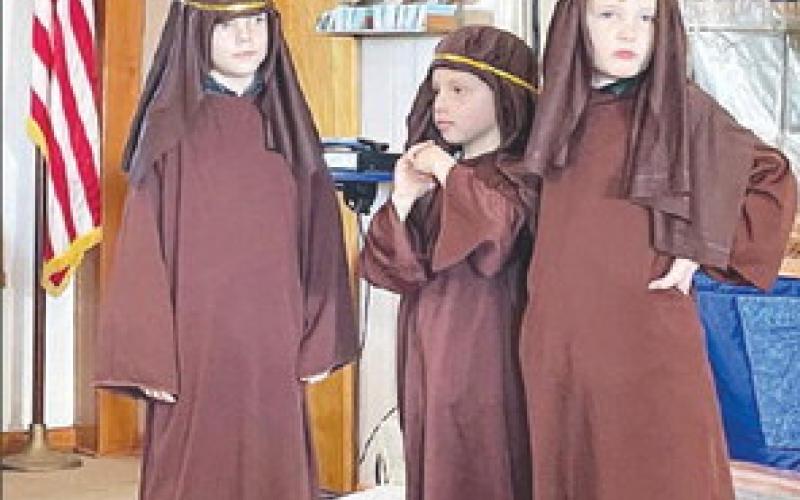 The Sunday School class at United Parish Church in Timber Lake presented the Christmas story during worship service on Sunday, December 11. ABOVE: Ella Handeland as Mary, Isaac Zeug as Joseph, and Andrew Zeug as the donkey. RIGHT: The three shepherds (L-R) Eli Zeug, Barrett Hermes, and Liam Handeland.