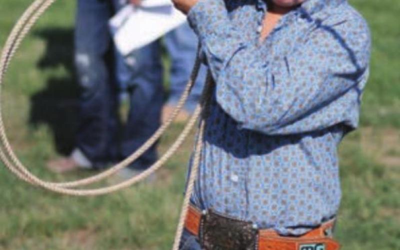 Royce Grueb, Dupree, gets ready to throw his loop in the beginner dummy roping.