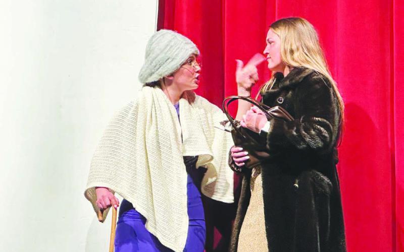McKenzi Vomacka (left) as Professor Vivian Strict has a word or two for Kate Biegler (Davina Arlington) in “The Alibis.”