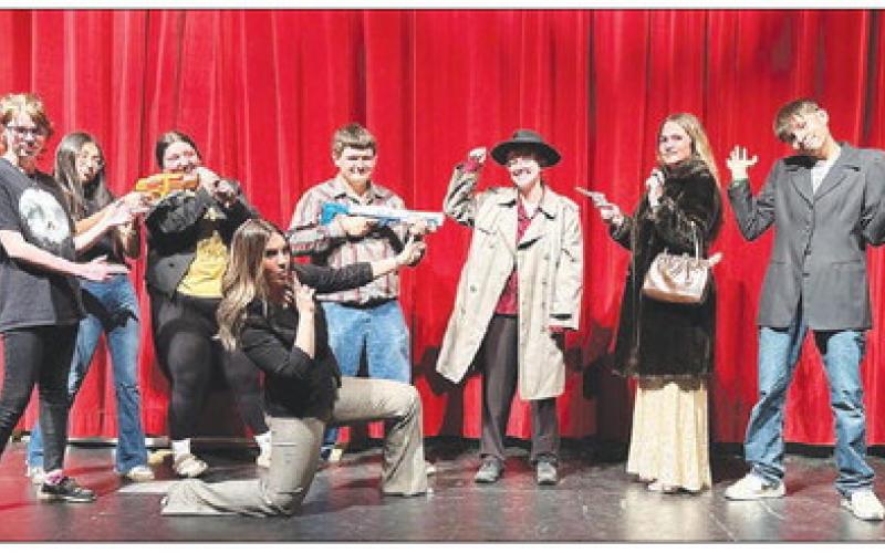 The cast of the one act play, “The Alibis,” one of two murder mystery comedies presented by the Timber Lake High School drama department May 3-5. L-R are River Boysen, Amanda Red Bear, Anna Kraft, McKenzi Vomacka, Jesse Ridl, Maria Scherer, Kate Biegler, and Sid Morgan.