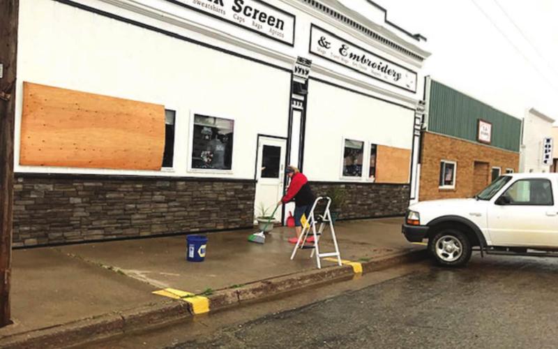 Dakota Silk Screen had just finished a new paint job last week only to be struck by hail that damaged paint and broke windows on Tuesday morning.
