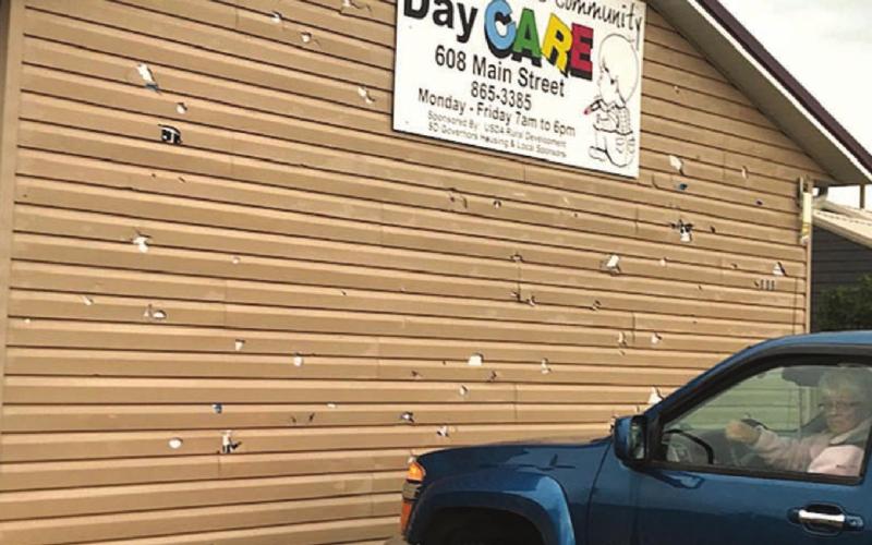 The siding on the Timber Lake Community Day Care took a beating from the golf-ball size hail. Photos by Jon Flatland