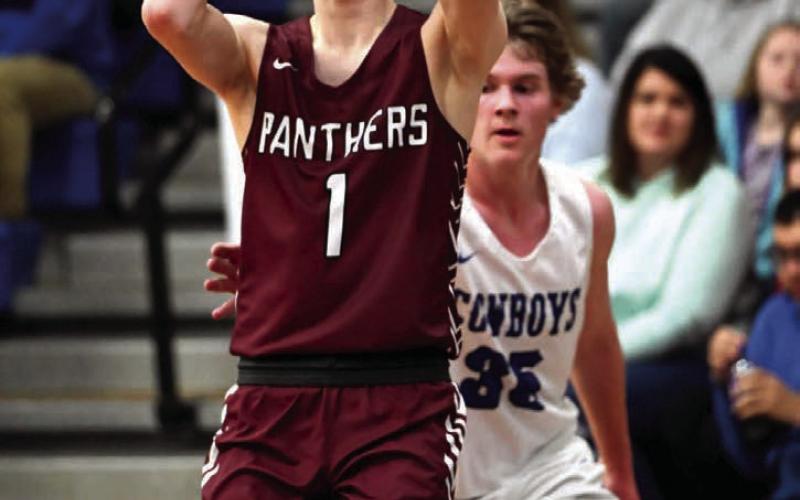 Timber Lake senior guard Kody Keller puts up a baseline jumper during the Region 8B SoDak 16 qualifier last week against Lemmon. The Panthers avenged two losses to the Cowboys this season with a 54-53 win, moving them to the state tournament qualifier. Photo by Marie Du Preez