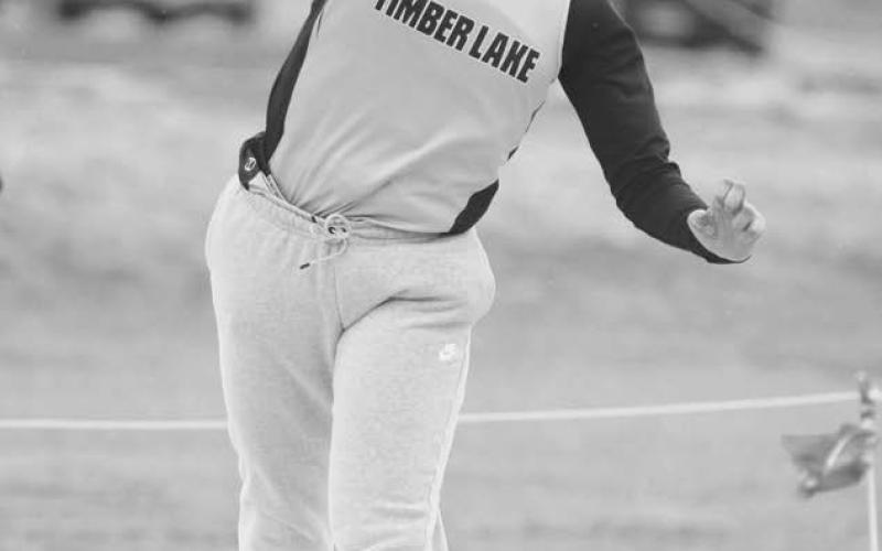 Jasmine Nash launches the shot put during competition at the Timber Lake Track Invitational last Tuesday, April 25. Her throw of 34-8.5 feet garnered her top honors in the event. Photo by Jon Flatland