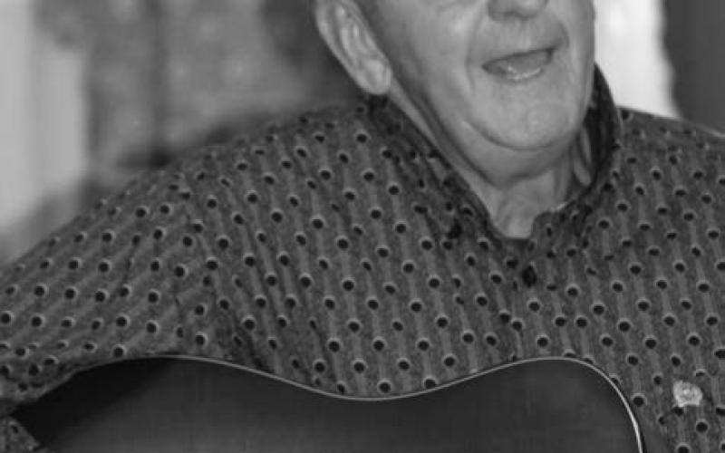 Local singer/songwriter Jon Holmes performed at the annual meeting of the Ziebach County Historical Society.