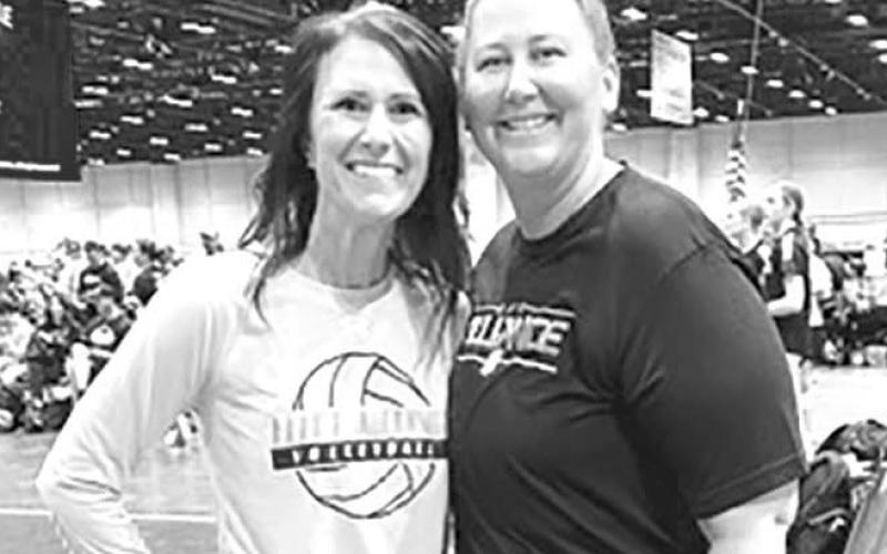 Jillaine Pfeifle Smith (Timber Lake High School Class of 2007) and head coach Ashley Heinrich