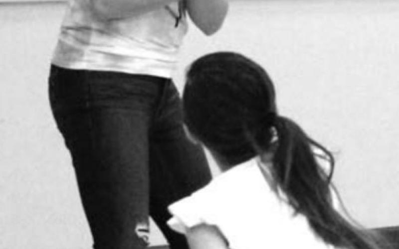 RIGHT: NHS member Erin Lemke prepares herself, acting like it’s going to be bad, as a PreK student throws a soft indoor “snowball” at her.
