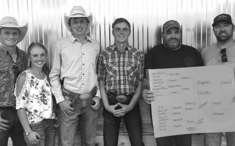 Corn hole tournament winning teams. (L-R) Sterling and Victoria Holland (thrid place), David and Denver Paul (second place), and Mike Barnes and Brandon Schmiesing (first place).